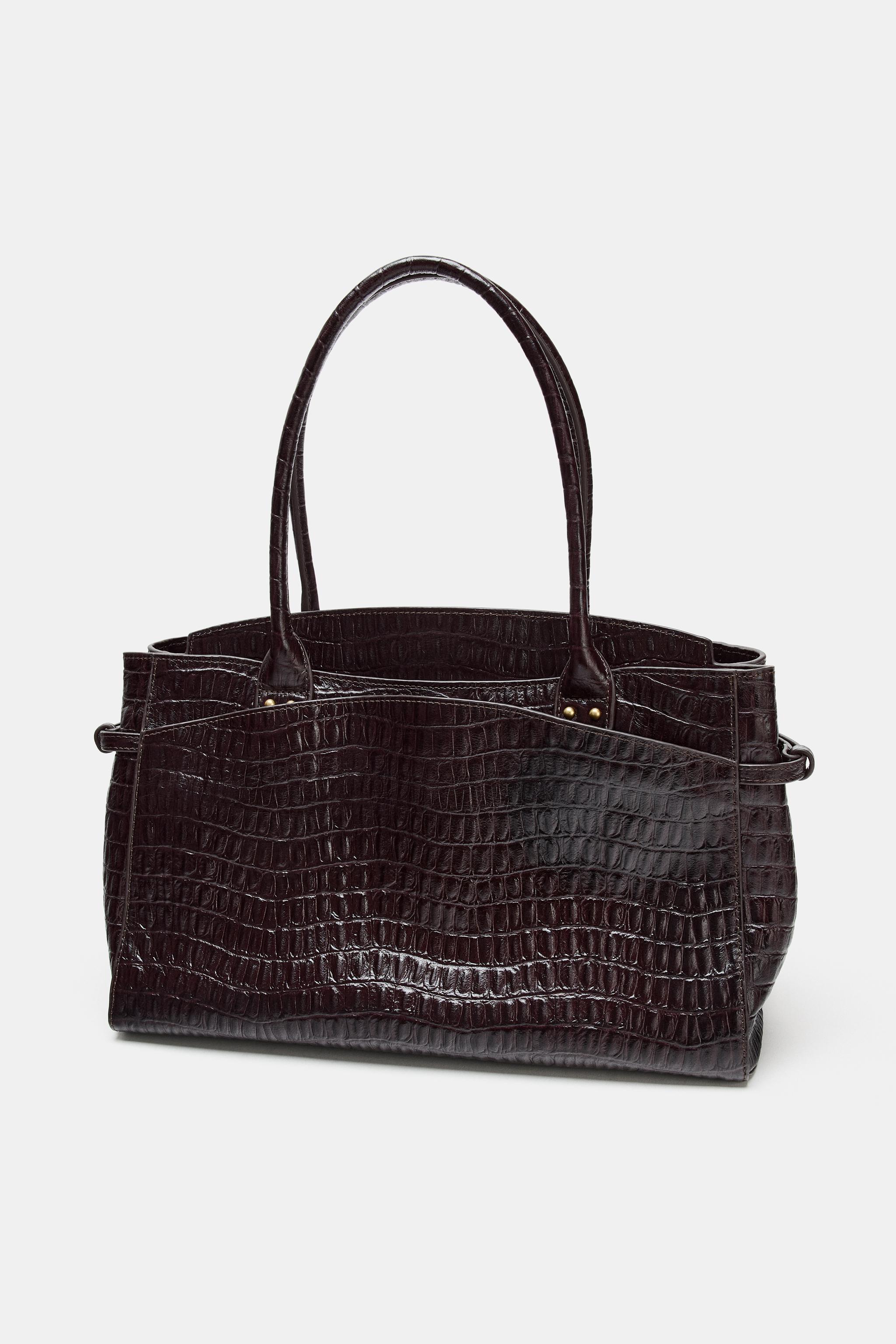 EMBOSSED LEATHER CITY BAG